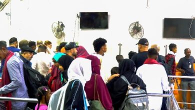 صورة وكالة السودان للأنباء لتقرير وصول سودانيين عائدين من موريتانيا إلى بورتسودان